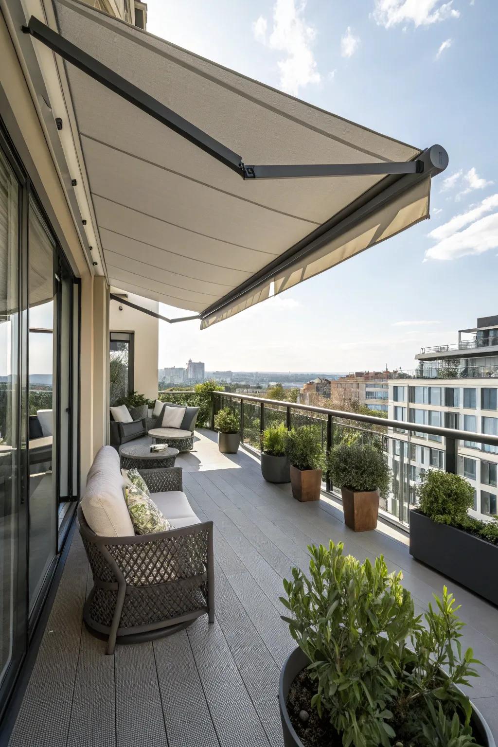 A refined retractable awning offers shade above a comfortable balcony seating arrangement.