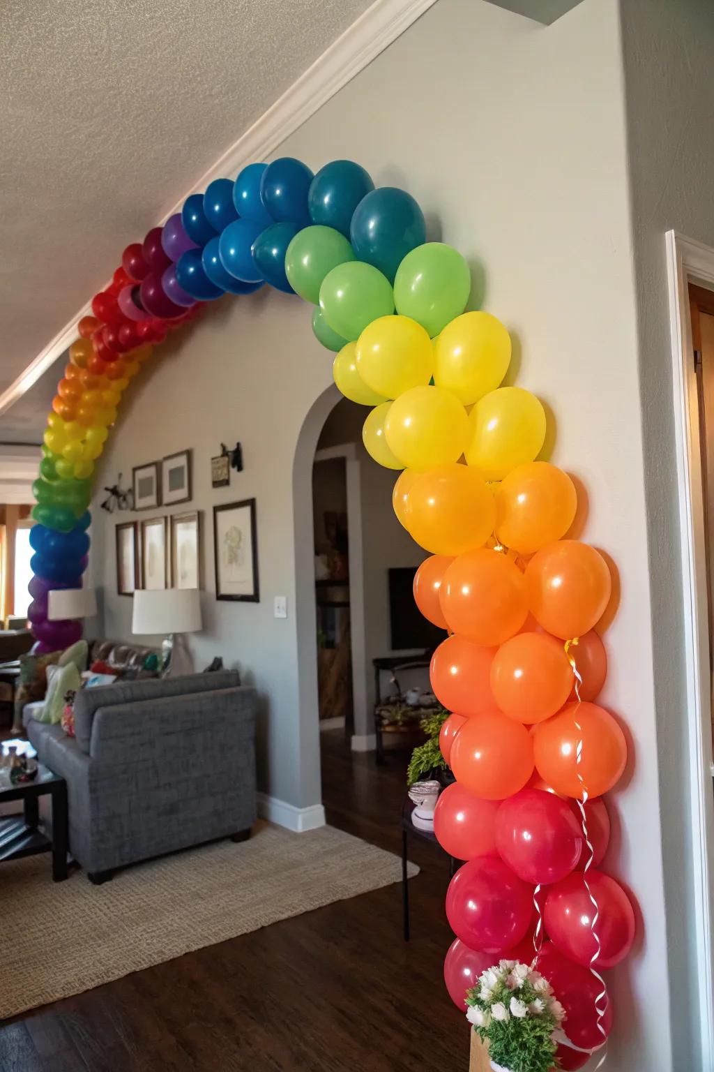 Rainbow balloon garland making a festive living room.