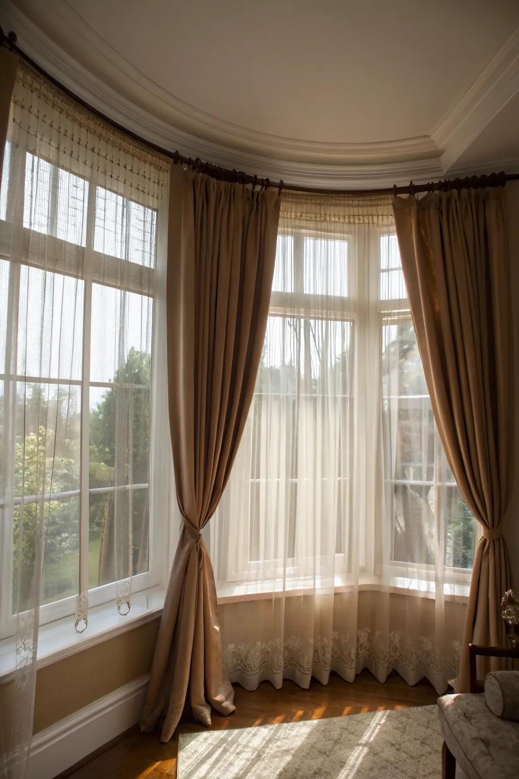 Layered curtains offer versatility and style for your bay windows.