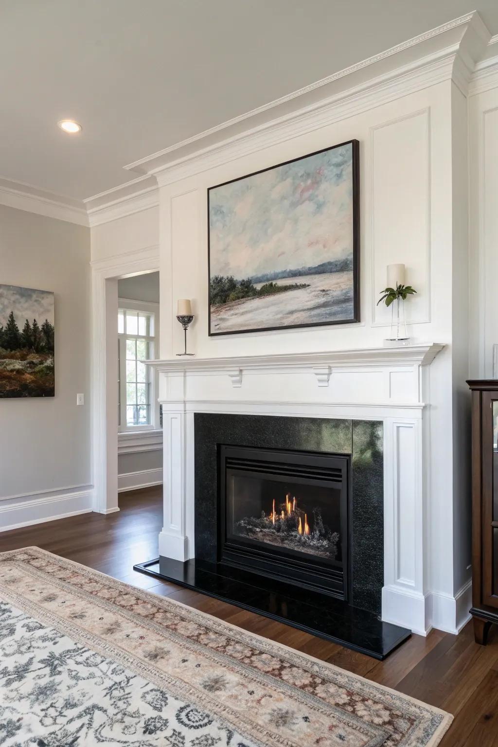 Embrace modern minimalism with a sleek black fireplace that complements bold artwork.