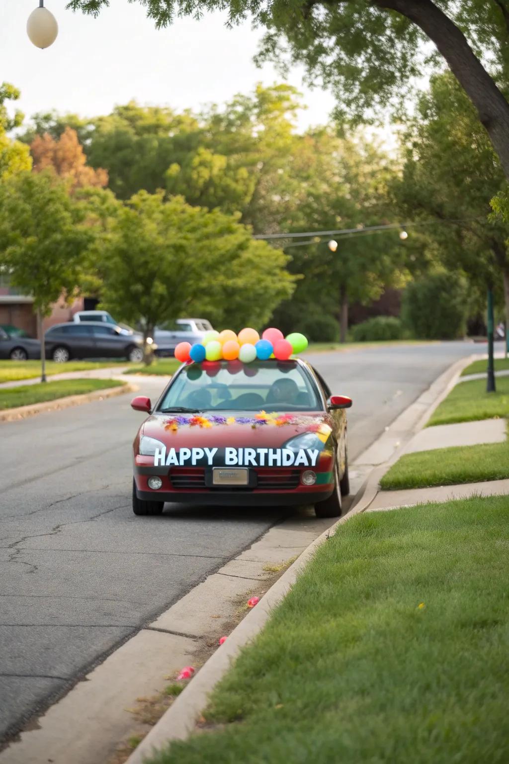 A car festively adorned with balloons and a birthday banner, ready to surprise.