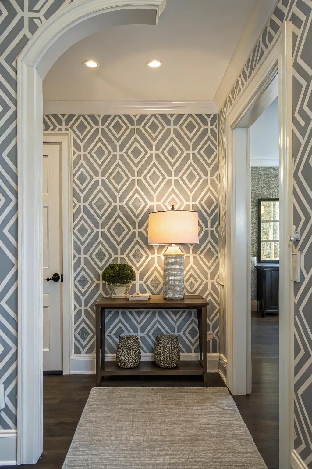 Modern entryway featuring bold geometric wallpaper for a contemporary vibe.