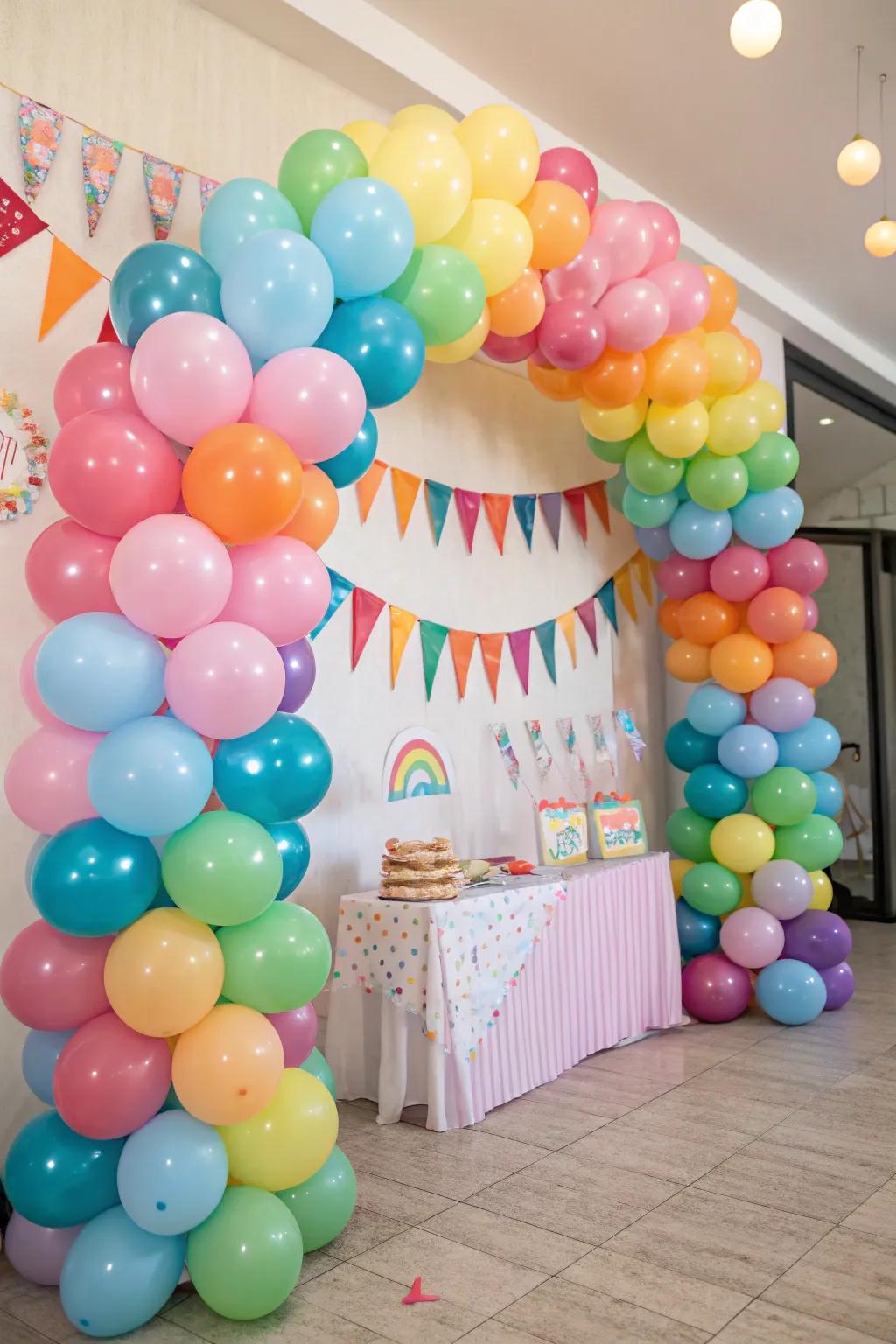 A vibrant balloon gateway makes a festive setting for the party.