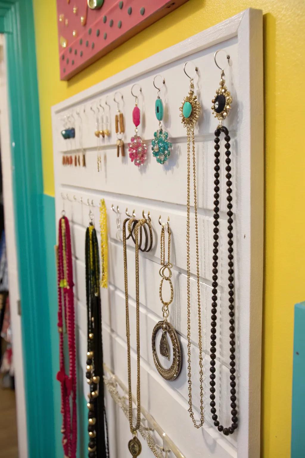 Turn your jewelry into a visual treat using wall-mounted hooks.