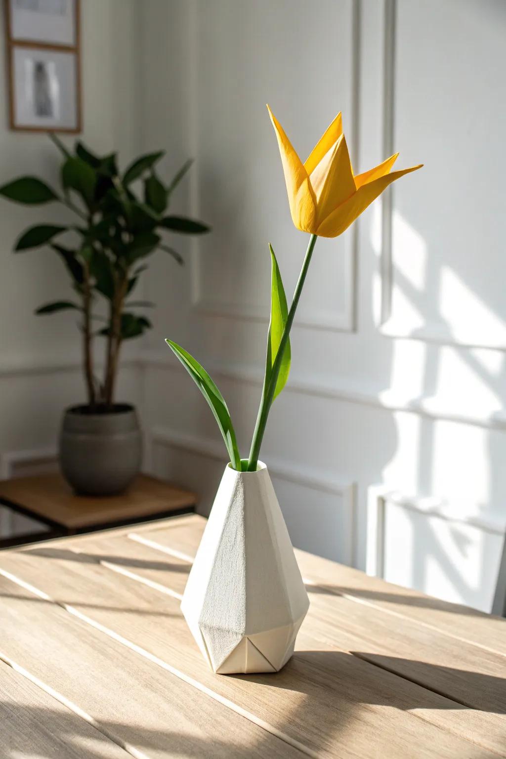 Relish in the simplicity and appeal of a radiant paper folded tulip presented in a bespoke container, an impeccable way to add a dash of sophistication to any interior.