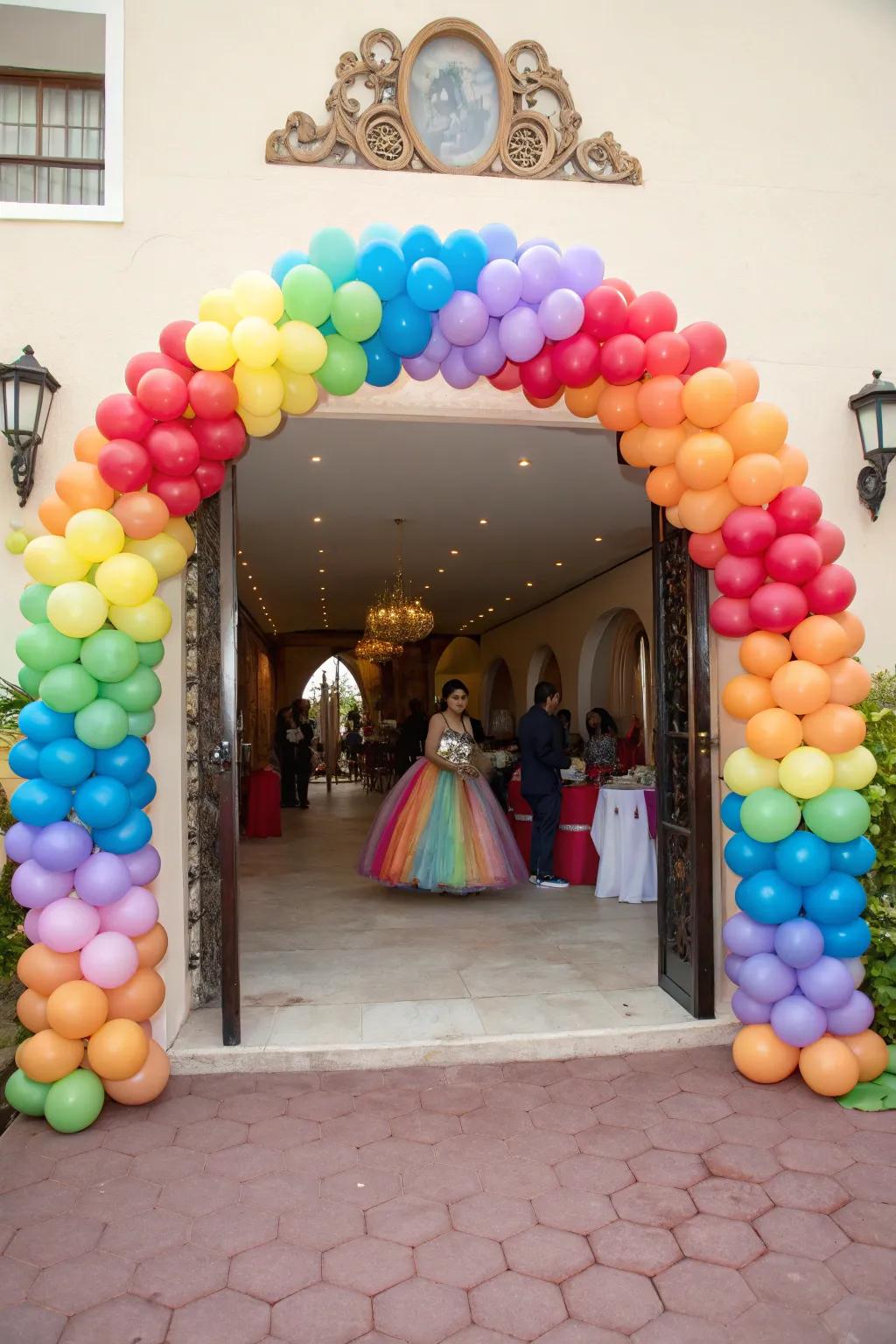 A magnificent balloon arch greets everyone at the quinceanera.