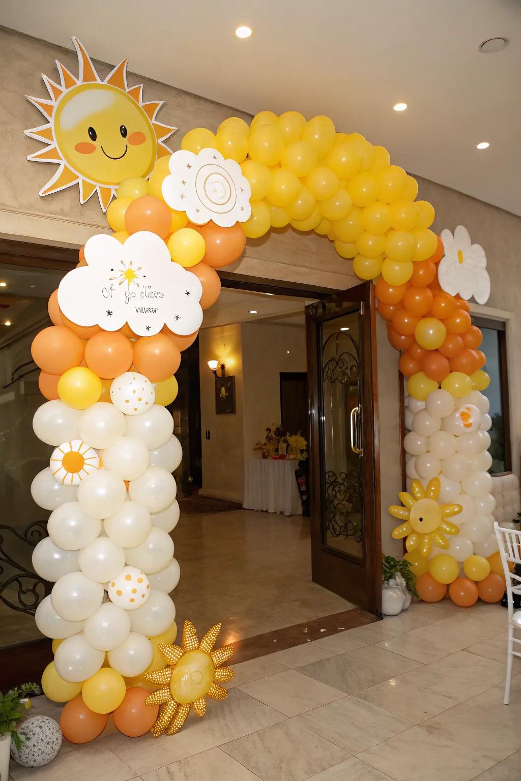 A cheerful balloon arch warmly greets visitors at the sun-filled baby shower.