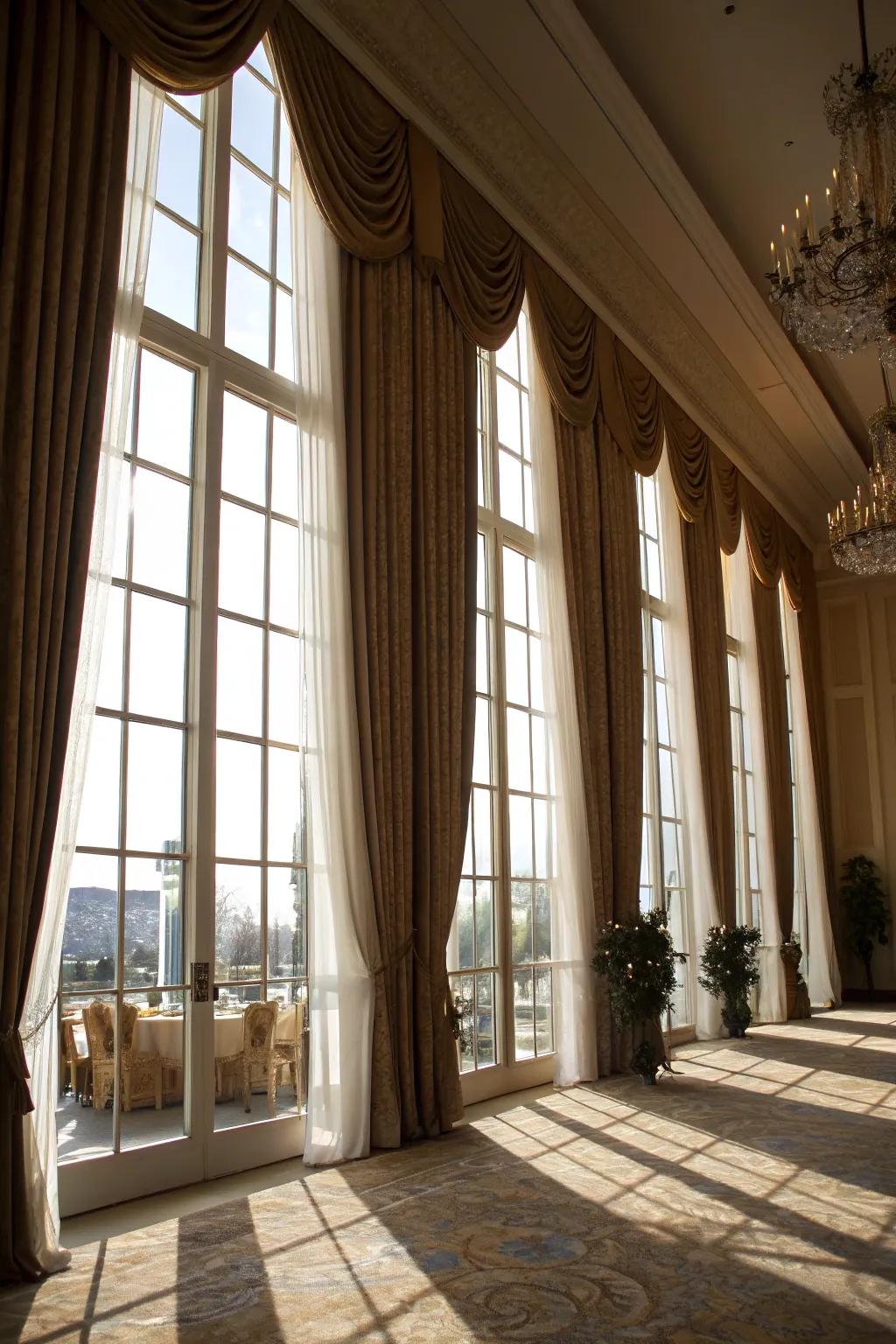 Sophisticated drapery enhancing the grandeur of high windows.