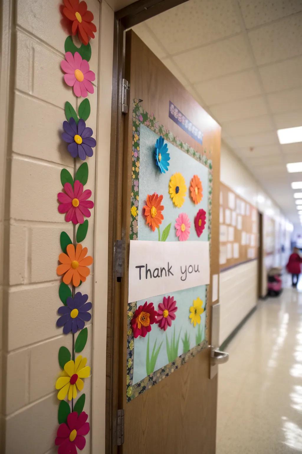 A vibrant garden of gratitude blooms on a classroom door.