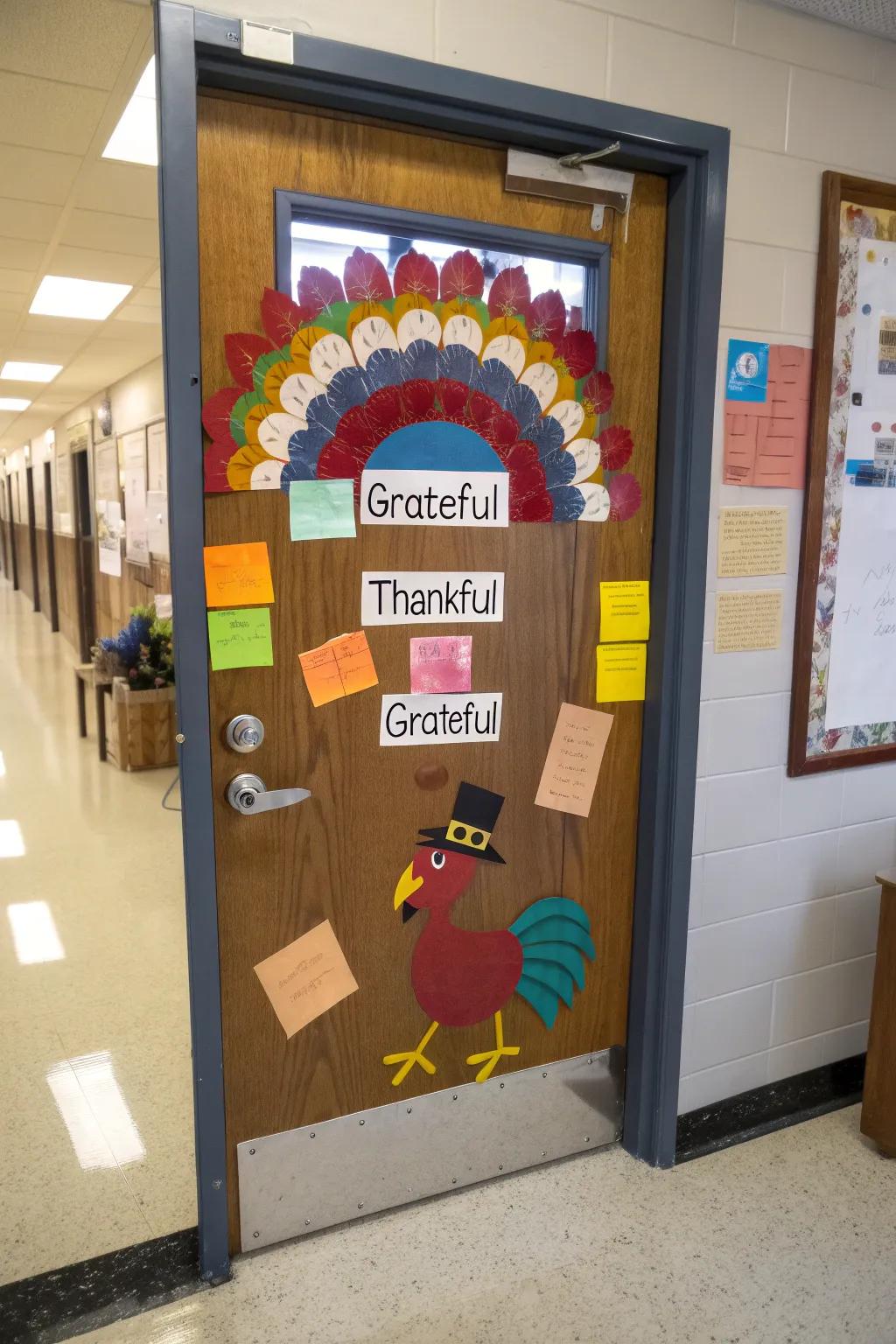 A Gratitude Bird door display with feathers displaying messages of gratitude from students.