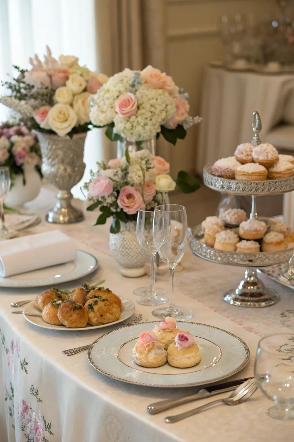 An elegantly arranged table featuring vibrant floral arrangements and a spread of delightful breakfast choices.
