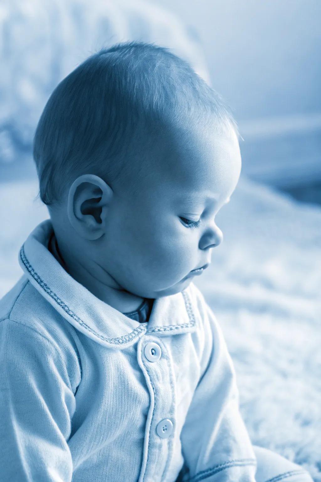 Shadow scale enchantment for a sophisticated baby photo.