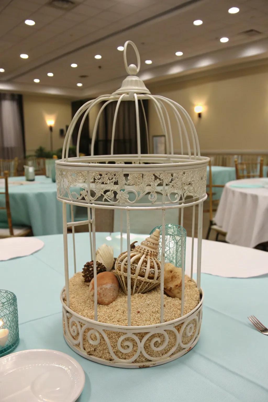 A seaside-motif cage centerpiece distinguished by aspects of the beach.