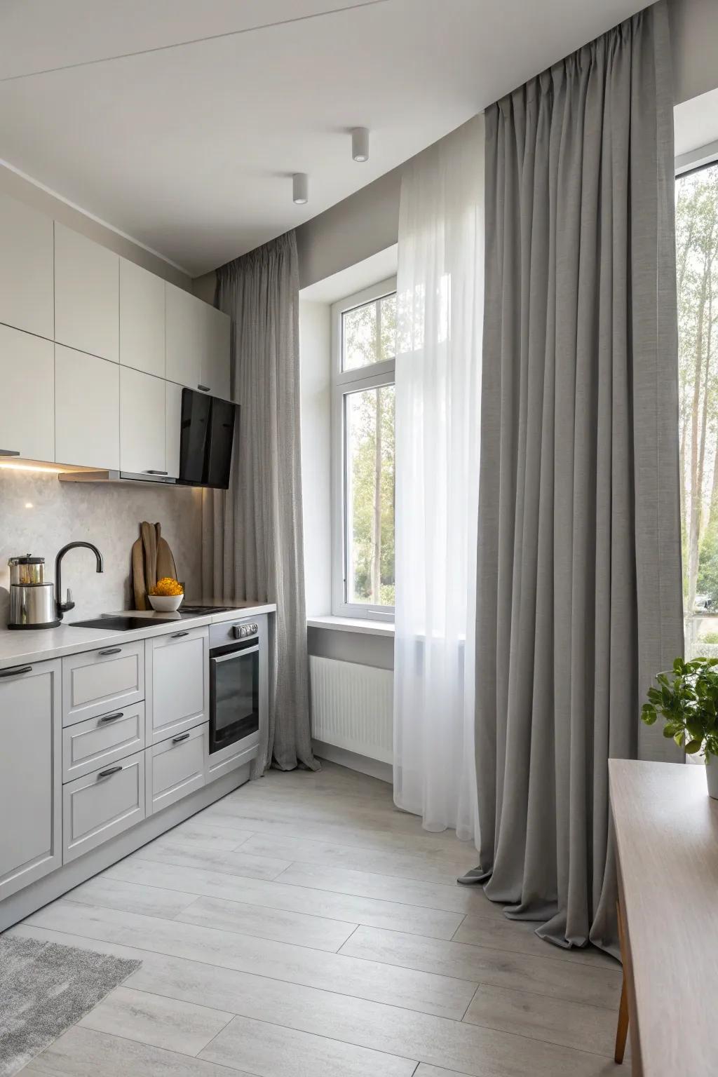Minimalist gray drapes that seamlessly blend with kitchen decor.