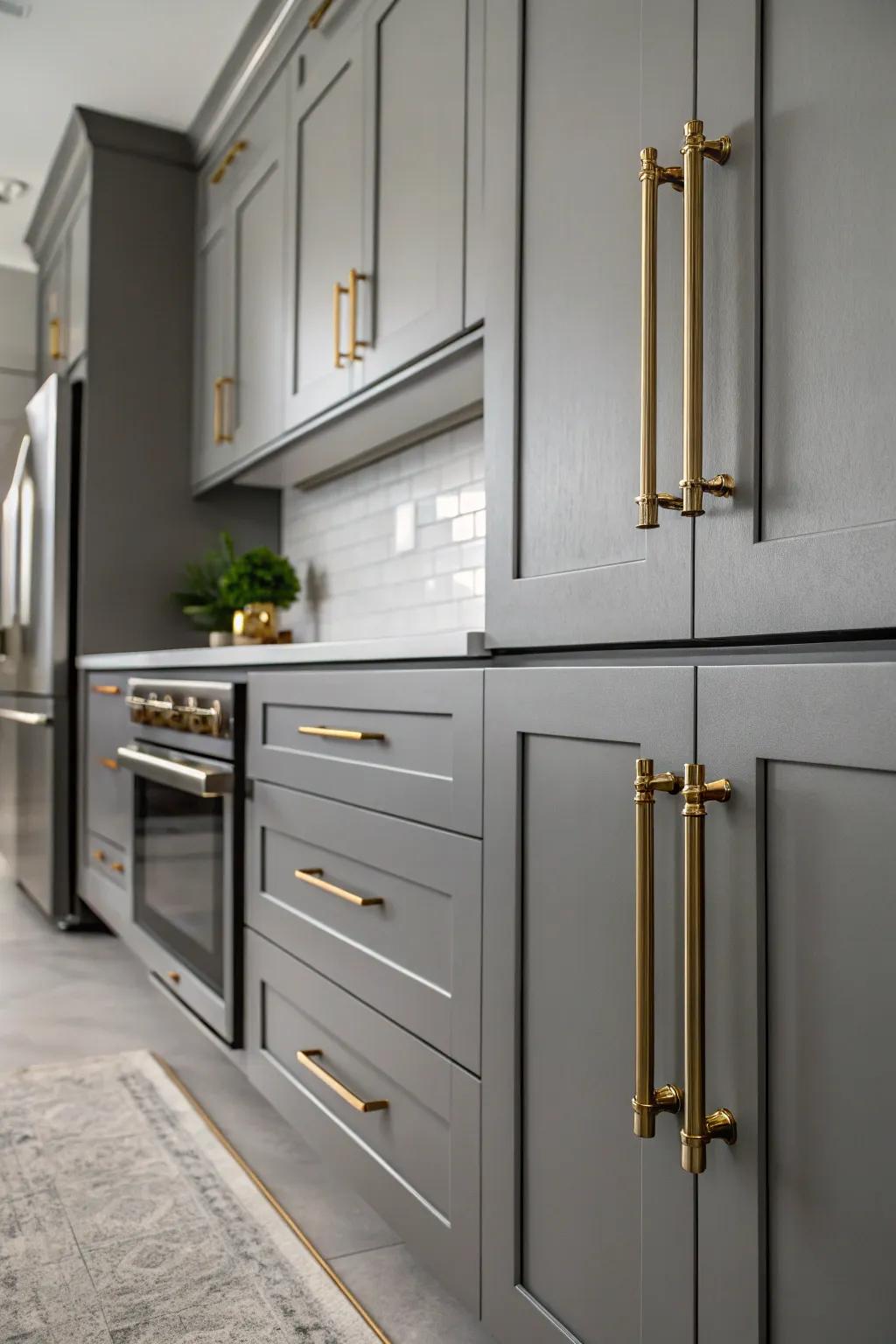 Metallic embellishments introduce a hint of glamour to a grey kitchen.