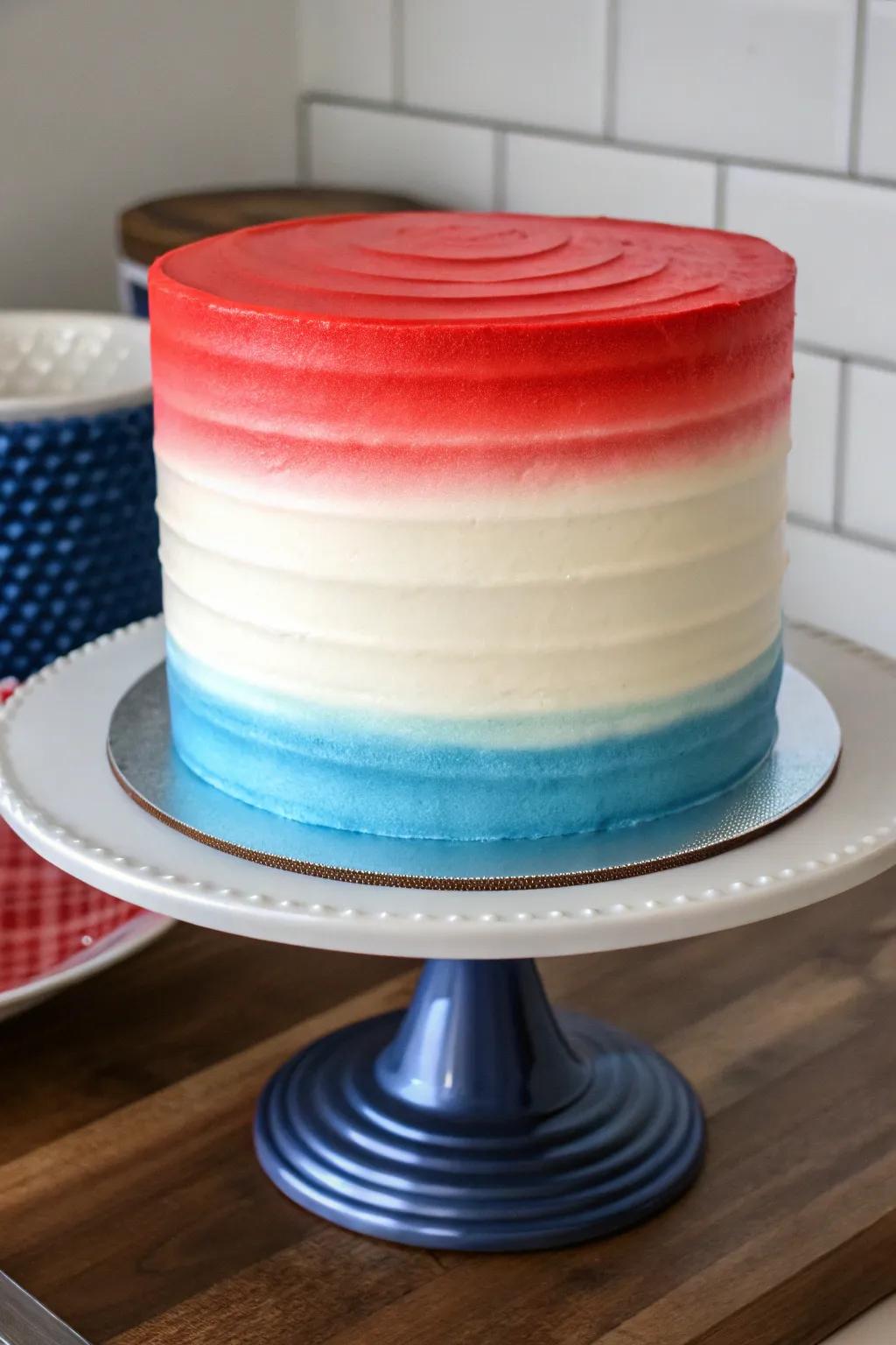 An ombre cake that seamlessly blends patriotic colors for a striking look.