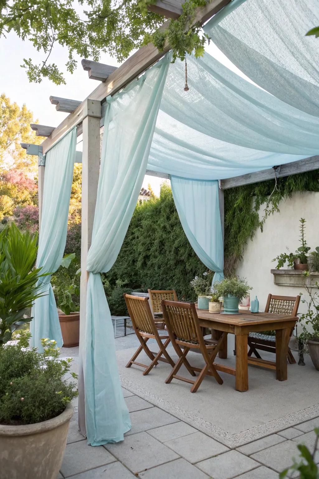 A DIY cloth canopy offering shade on a patio.