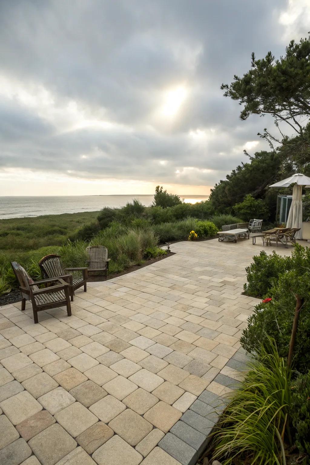 A paver patio with light-toned pavers, exuding a breezy coastal ambiance.