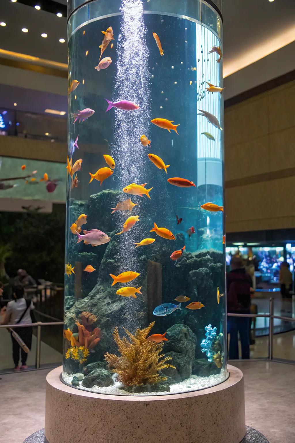 A vibrant consortium of fish within a towering aquarium.
