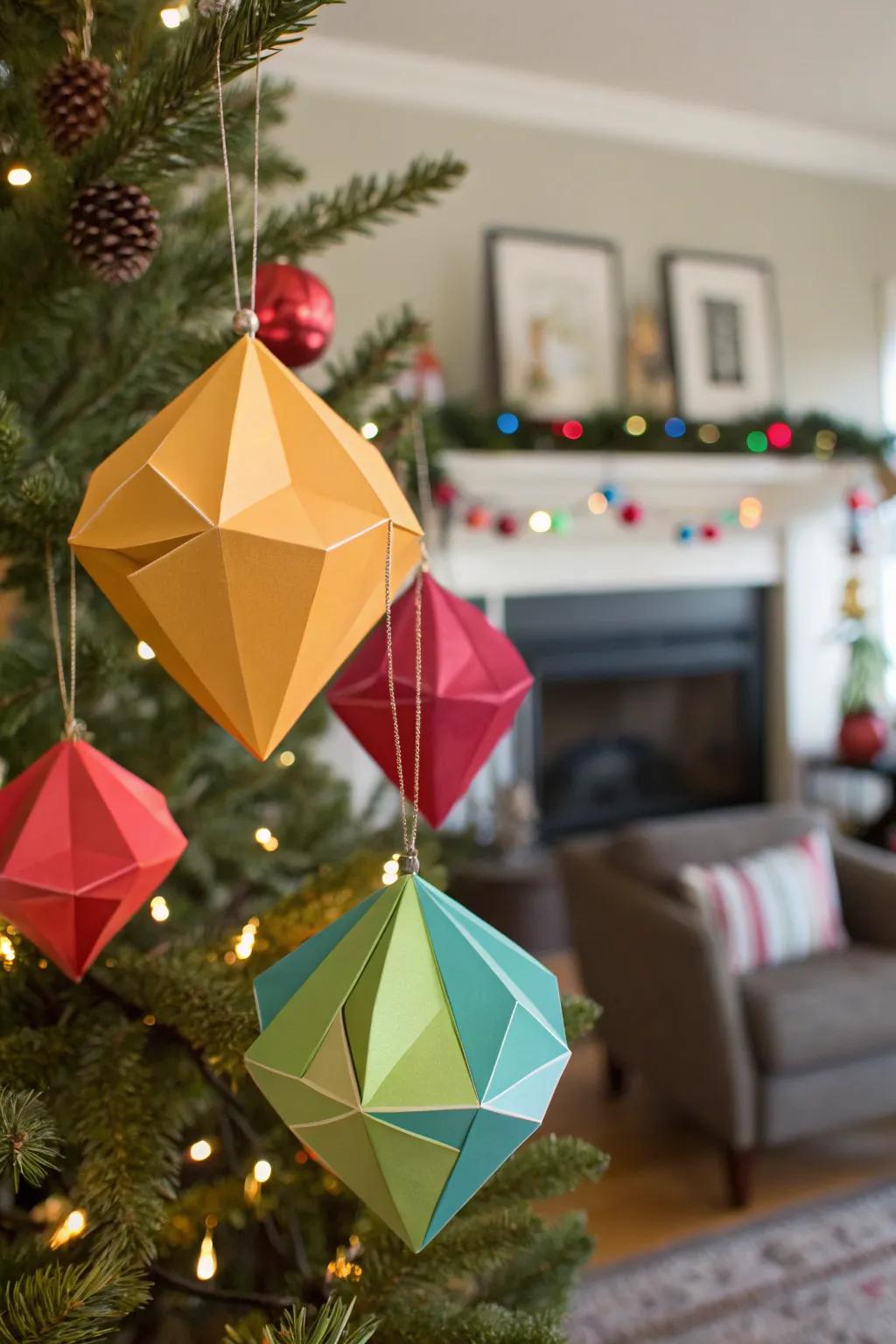 Vibrant geometric paper decorations displayed on a tree.