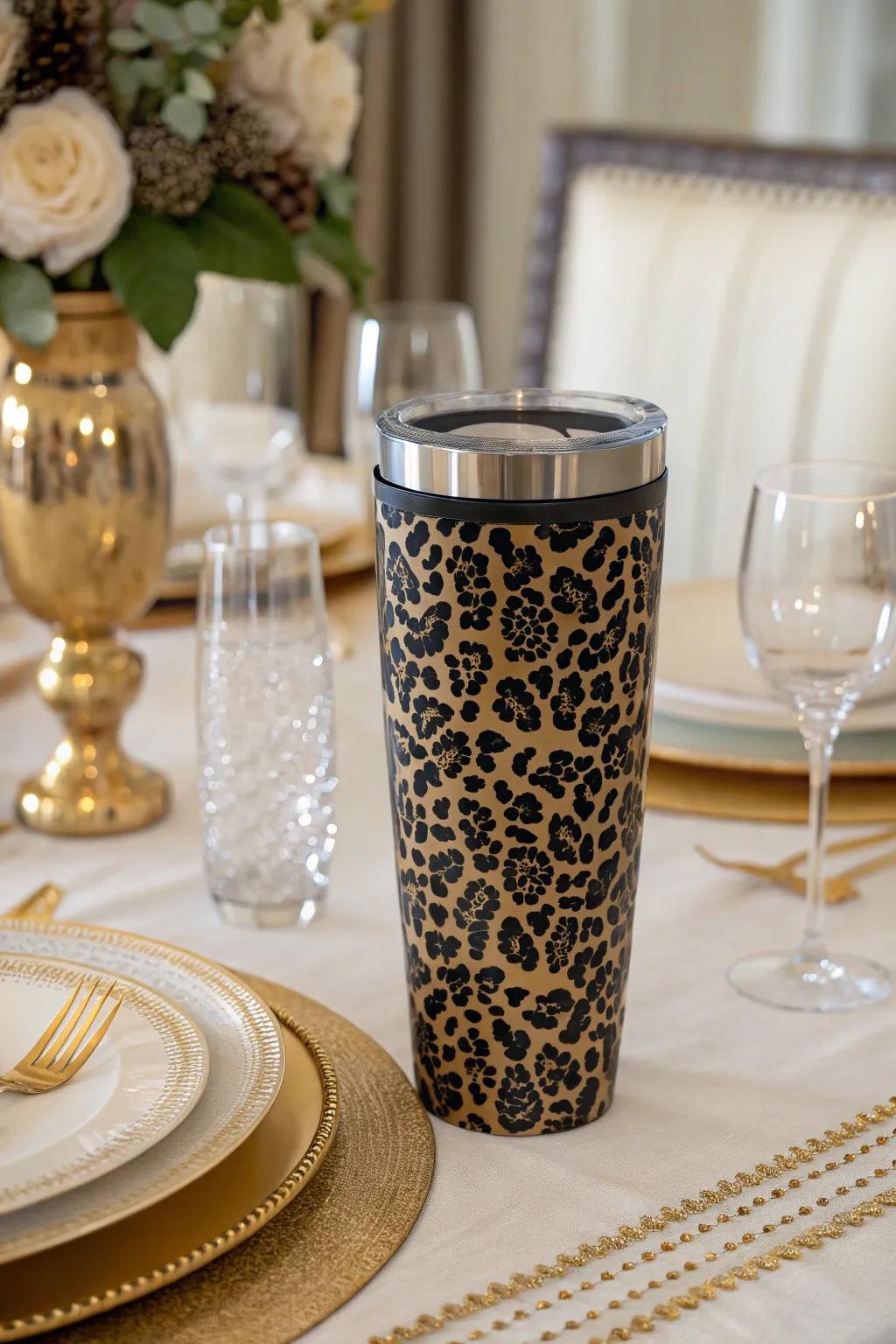 Effortlessly elegant black and gold leopard print cup for sophisticated gatherings.