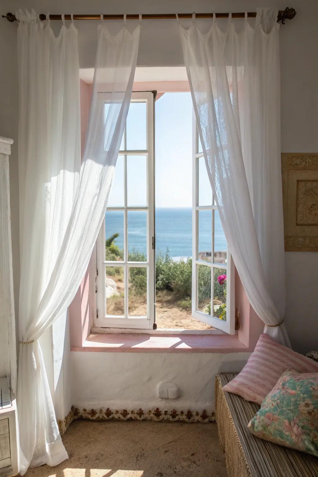 White curtains enhance natural light, creating a bright and open feel.