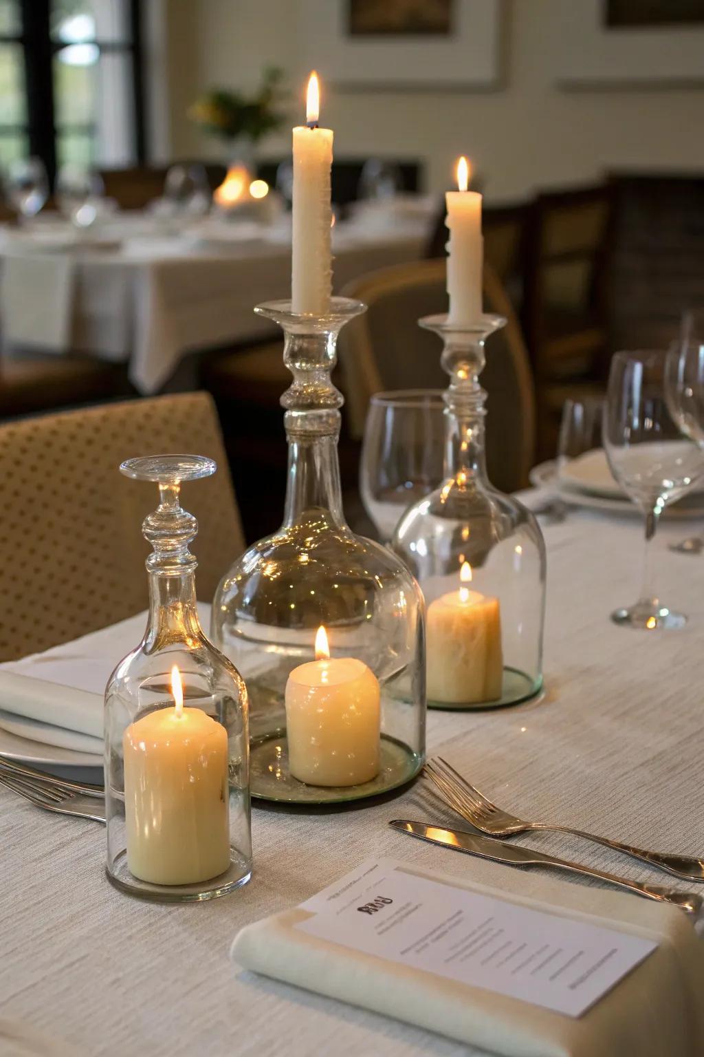 Carafes repurposed as candle holders for a cozy dining setup.