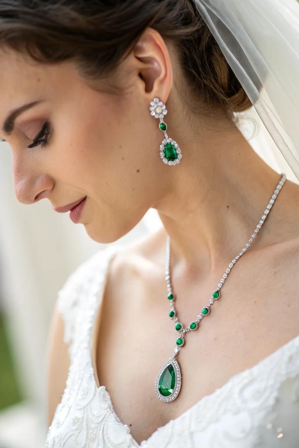 Celebration gems featuring graceful emerald stones.