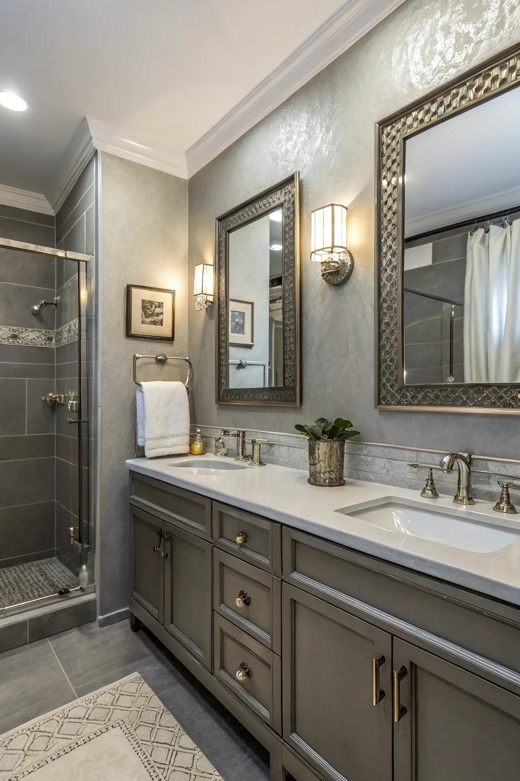 Metallic accents add a touch of luxury to the grey bathroom.