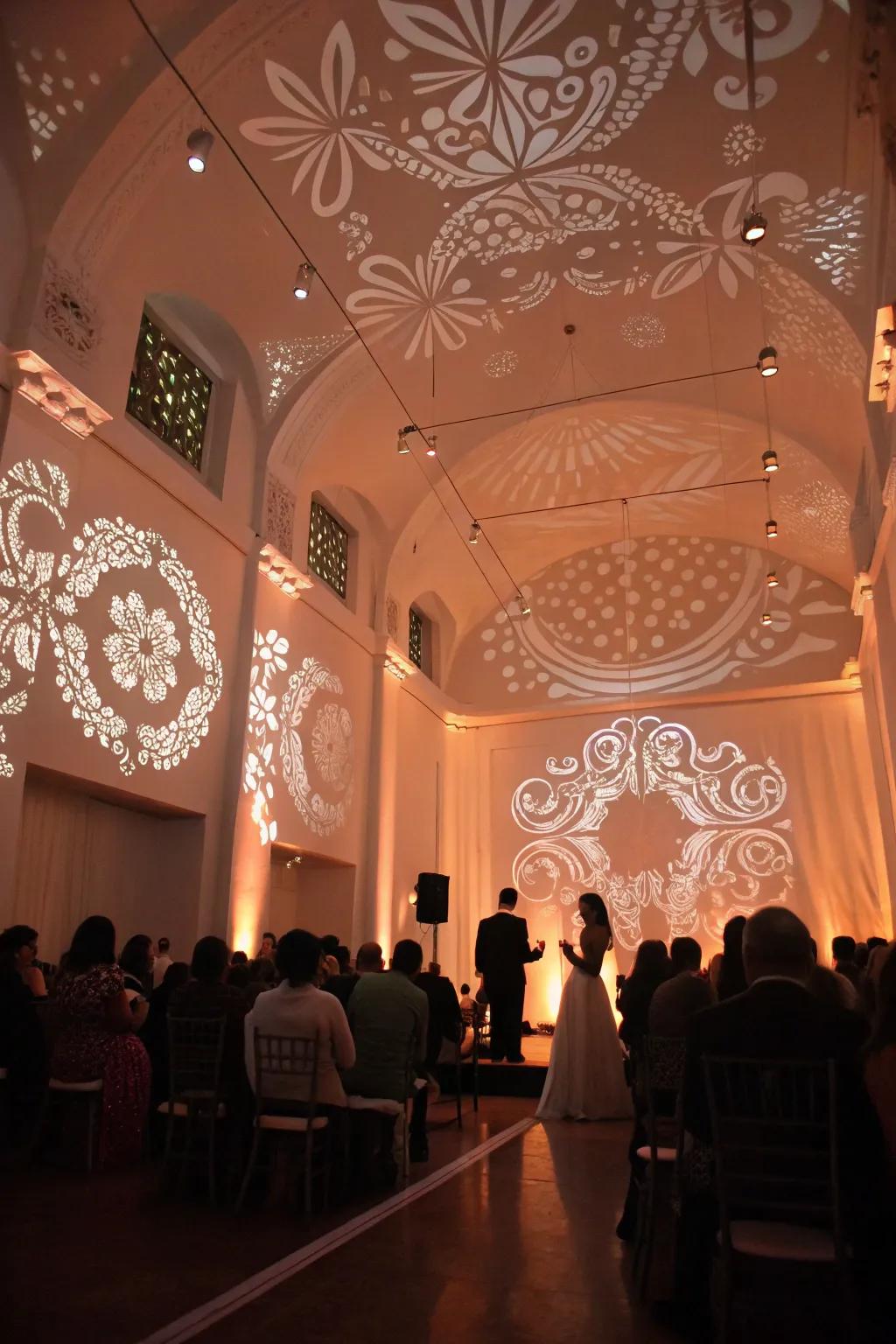 Stencil projections customizing the wedding space with style.