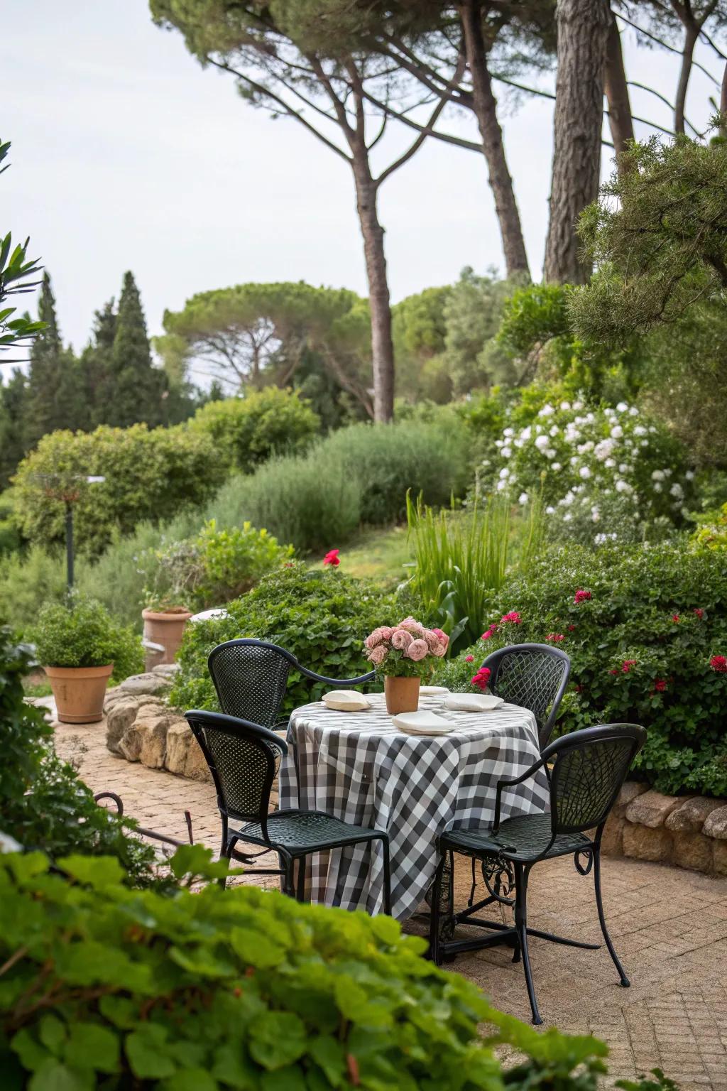 Fashion a verdant refuge with plant accents around your small outdoor dining set.