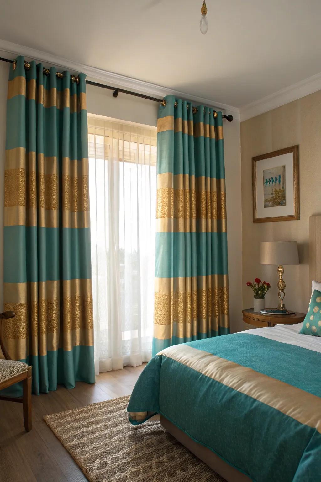 Striped window coverings in aqua and gilded tones add a bold yet elegant touch to this bedroom.