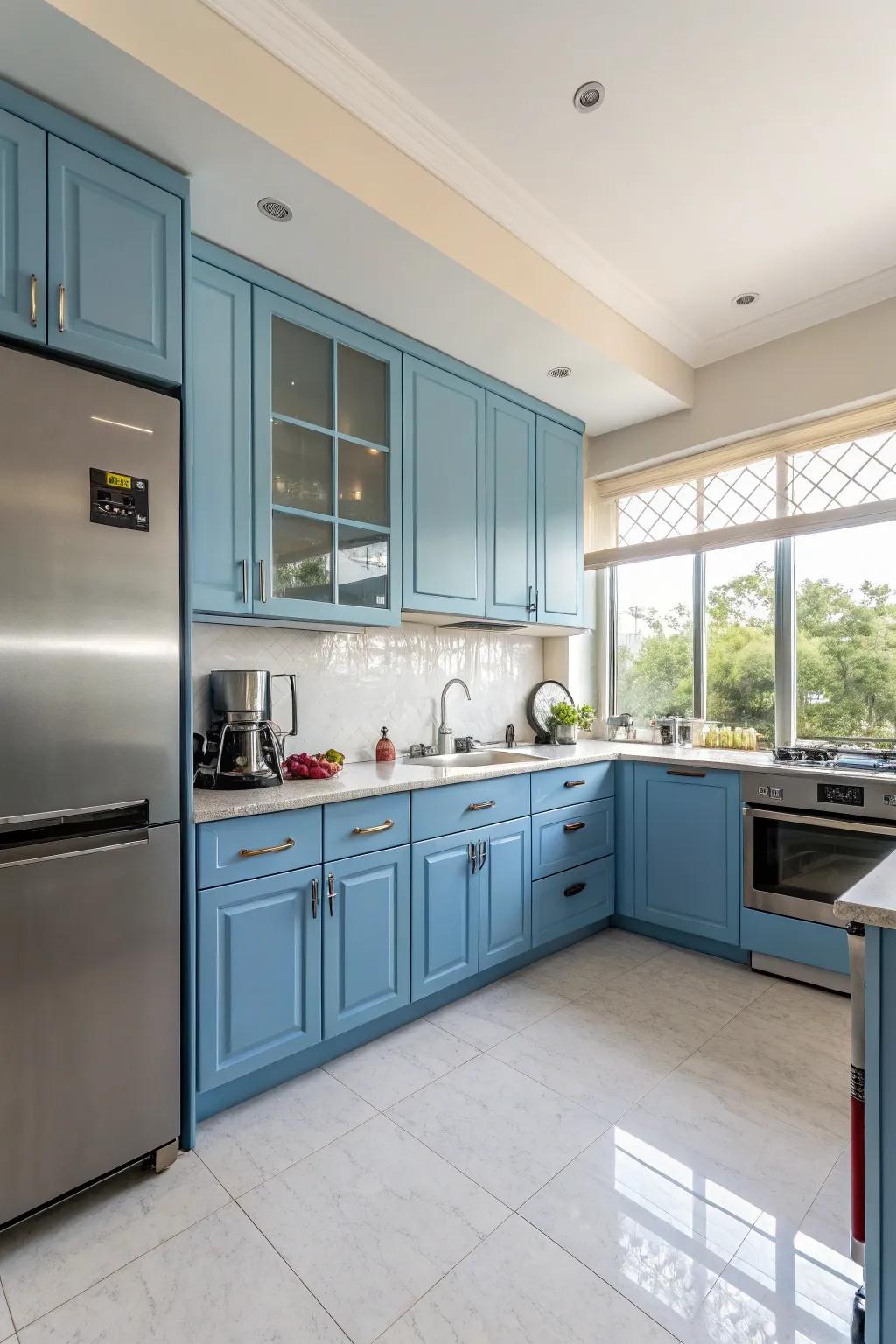 Contemporary sophistication with azure cupboards and stainless steel.