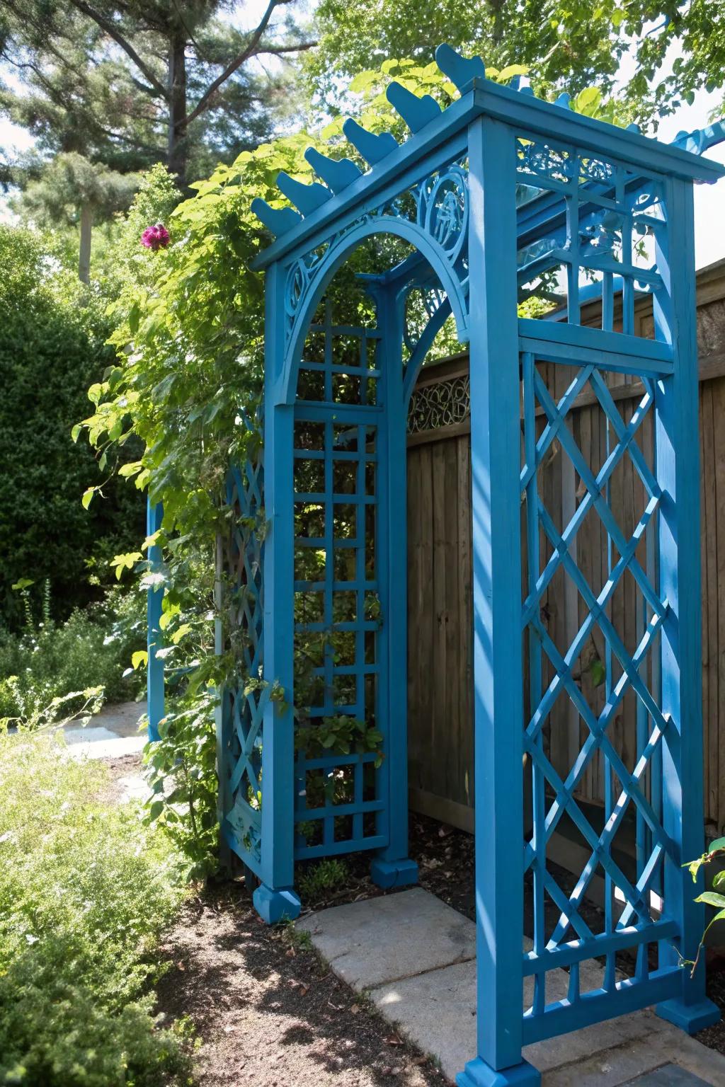 Elevate your backyard with a pop of color through a handcrafted bright blue trellis.