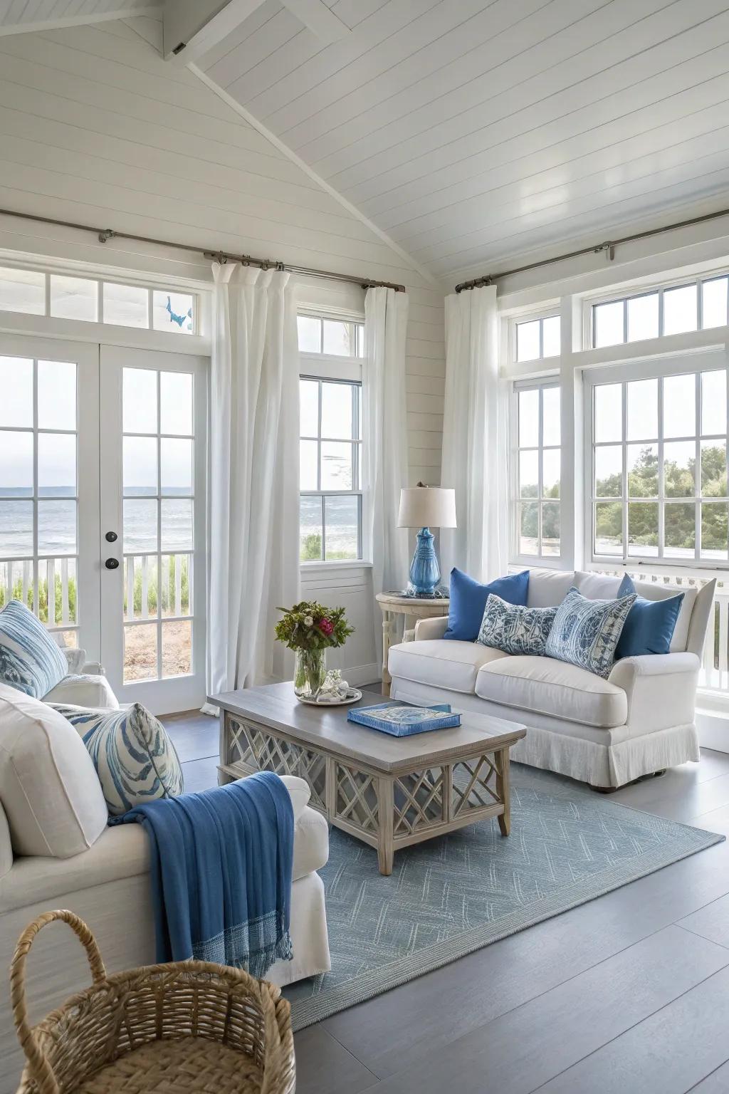 A serene coastal living room with light grey flooring.