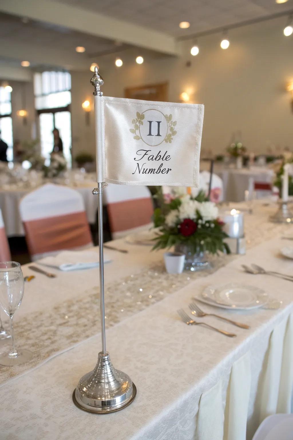Banner and base displays introduce a whimsical touch to your wedding tables.