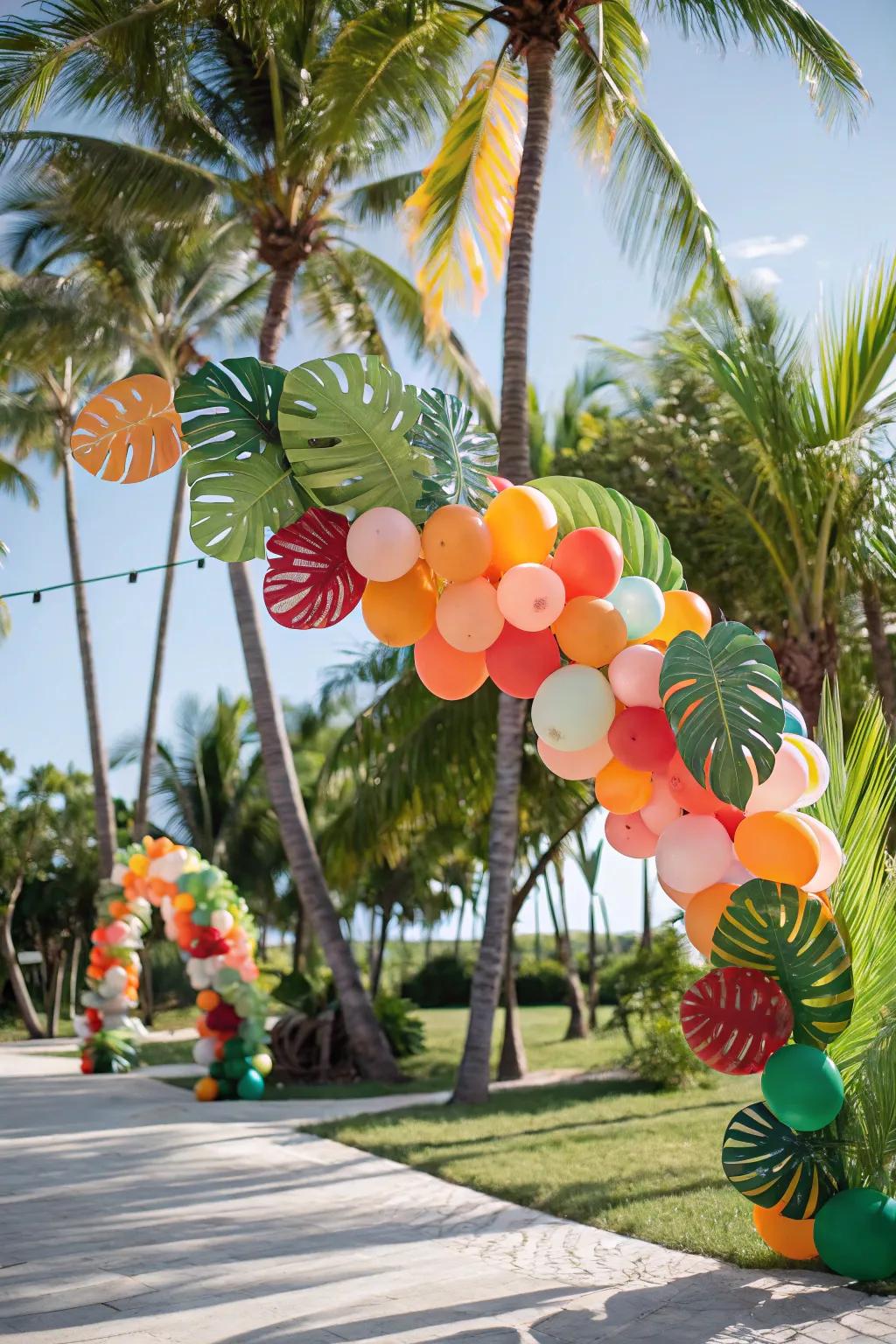 Tropical balloon garland making a paradise vibe.