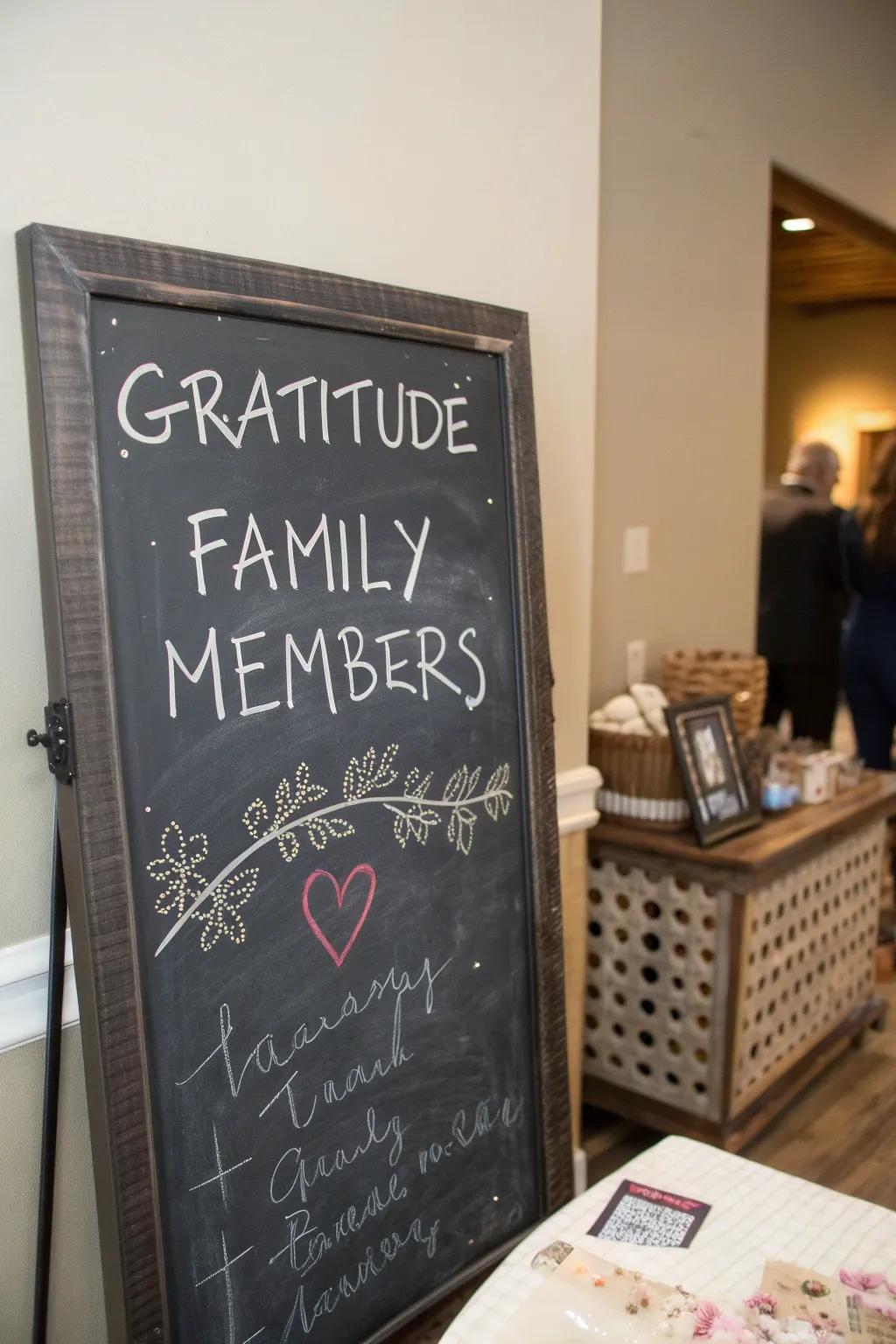 A chalkboard filled with handwritten notes of gratitude from family members.