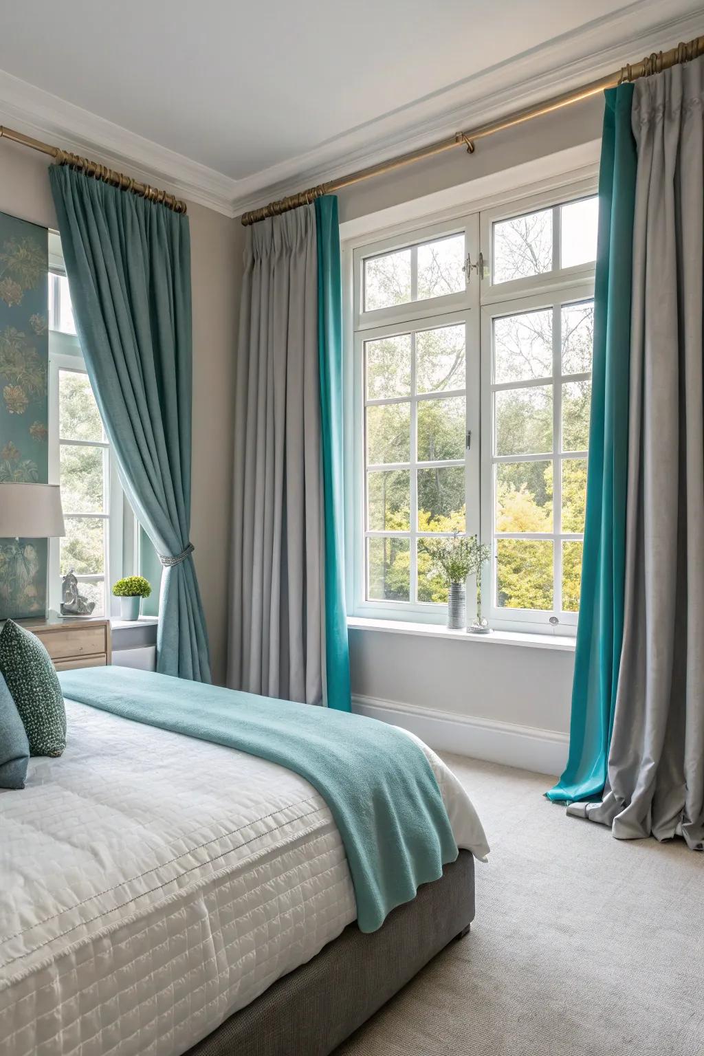 Window treatments in grey and teal complete the room's look.