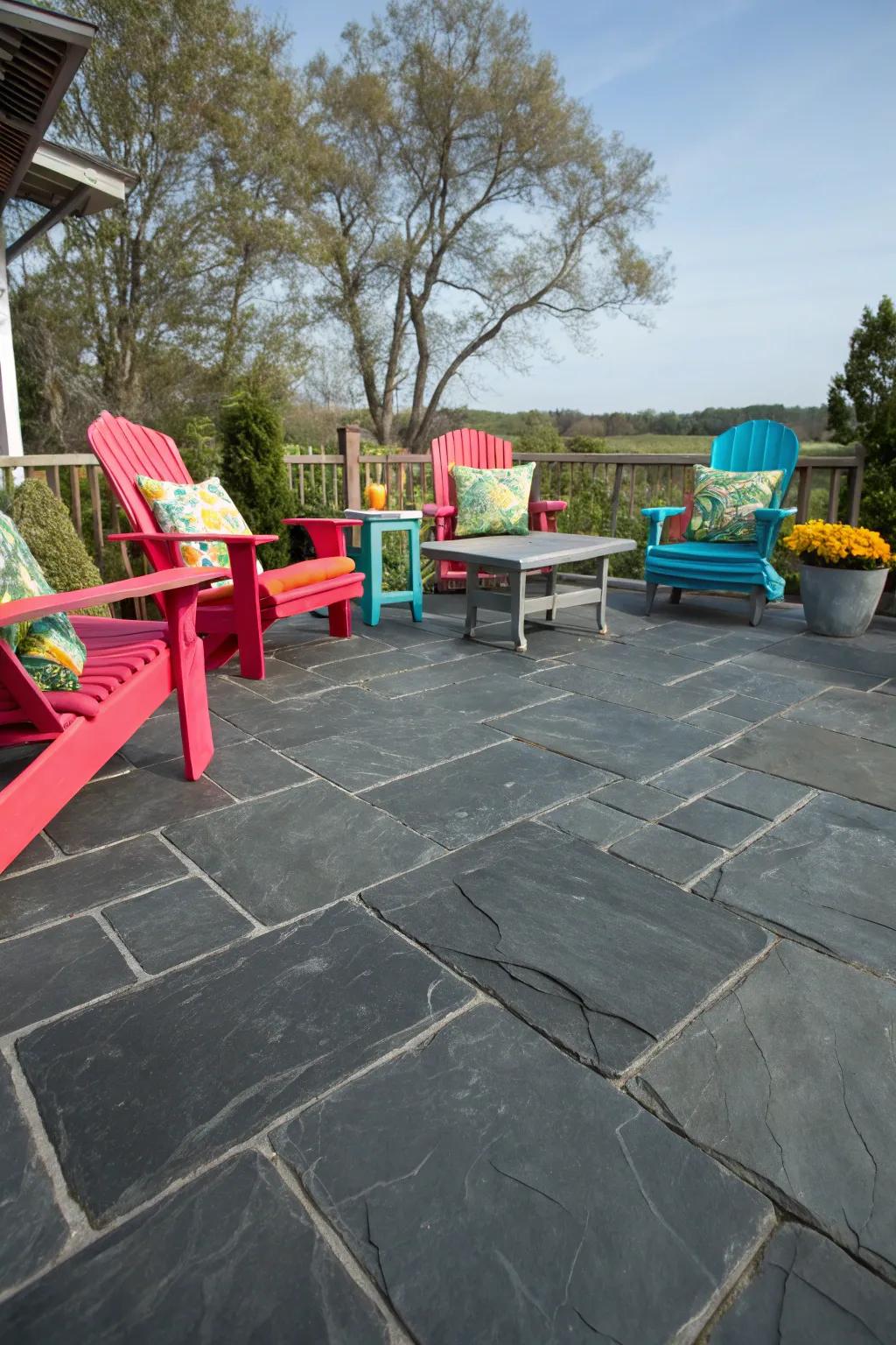 A slate patio with striking, contrasting hues in its decor.