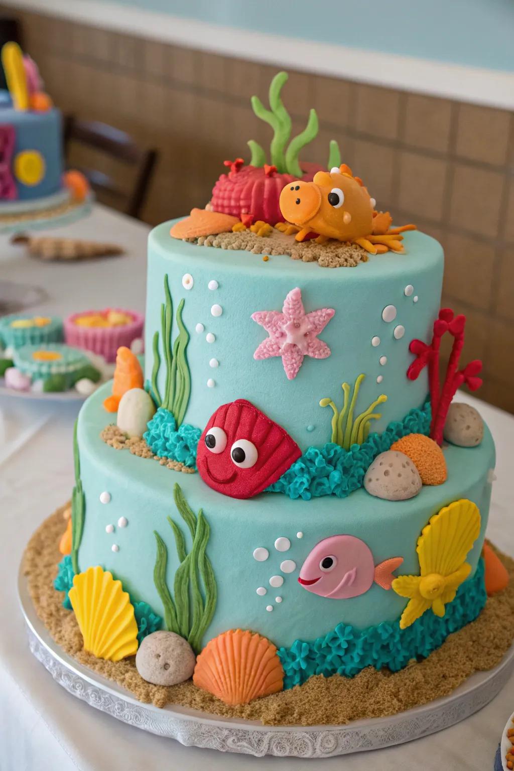 An ocean-themed cake with vibrant elements for a baby boy shower.
