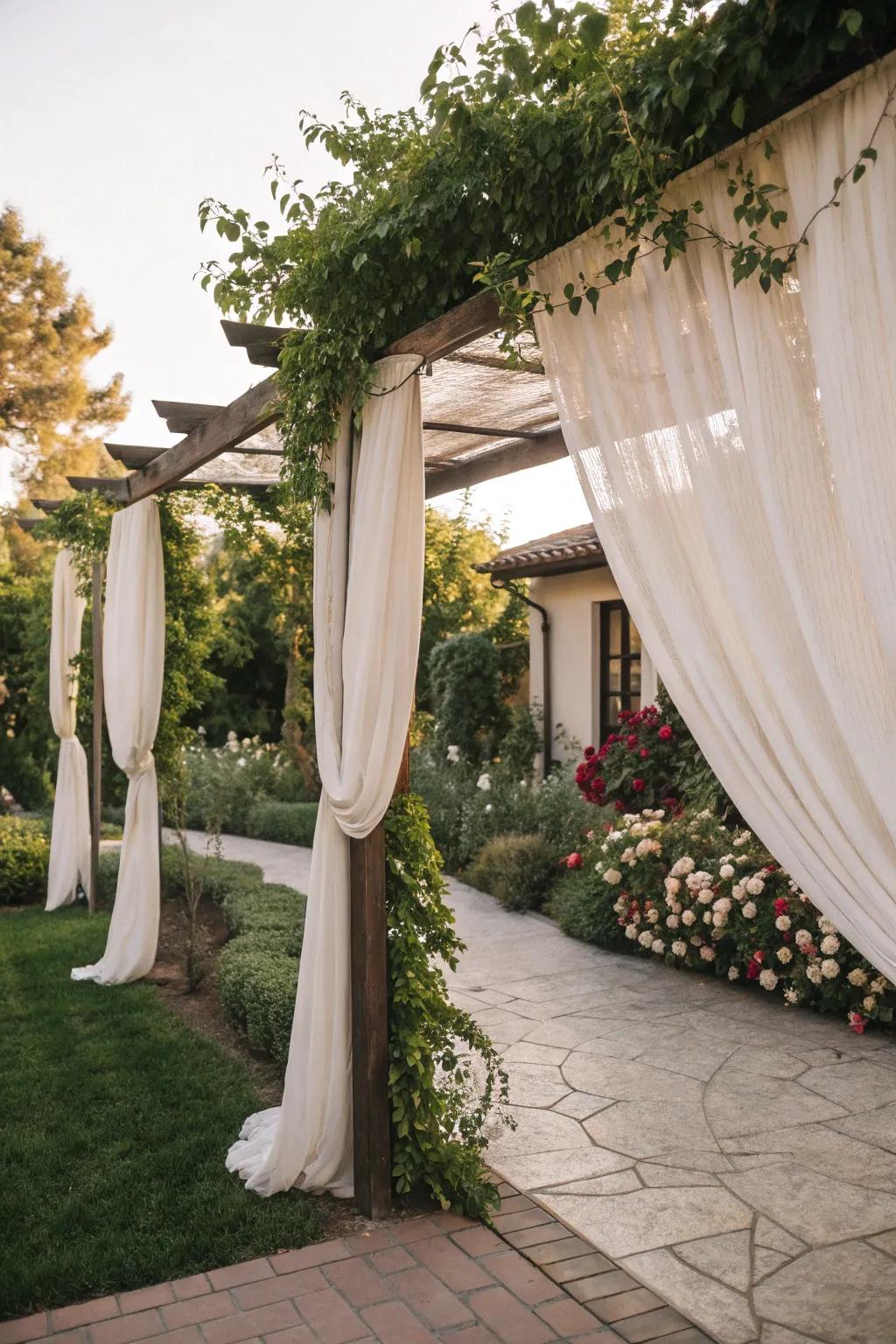 An arbor and curtains add elegance and seclusion.