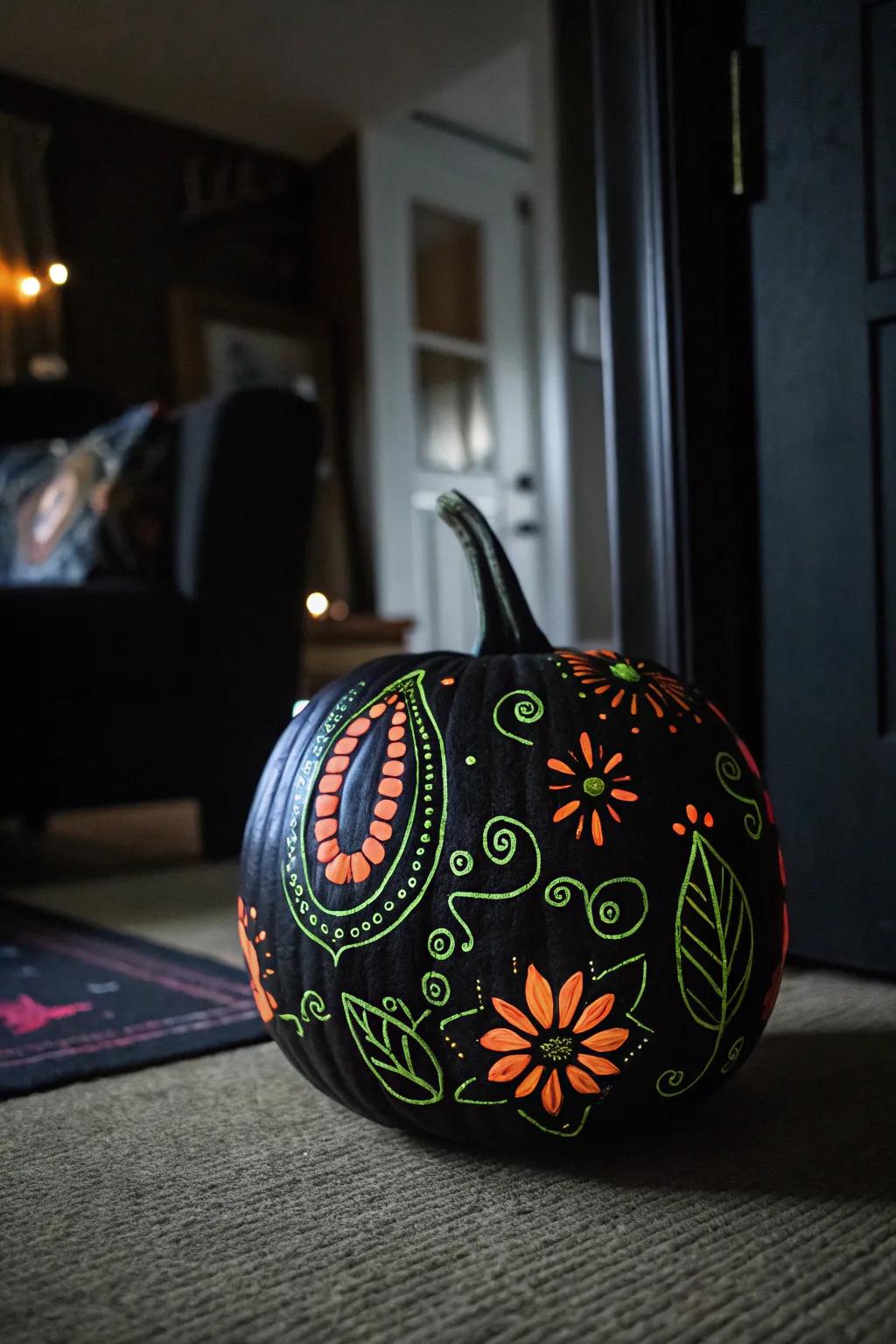 A black pumpkin with glow-in-the-dark designs, adding a magical touch to nighttime décor.