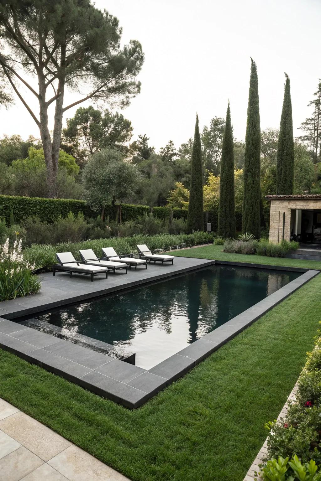 Black bottom pools add drama and elegance to any backyard.
