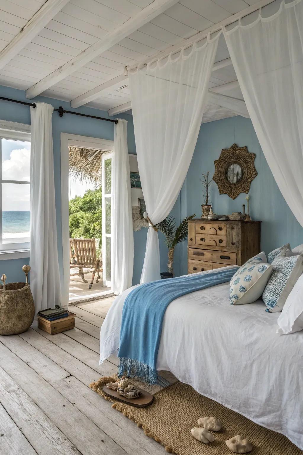 Pale drapes enhance the coastal vibes in this serene bedroom.