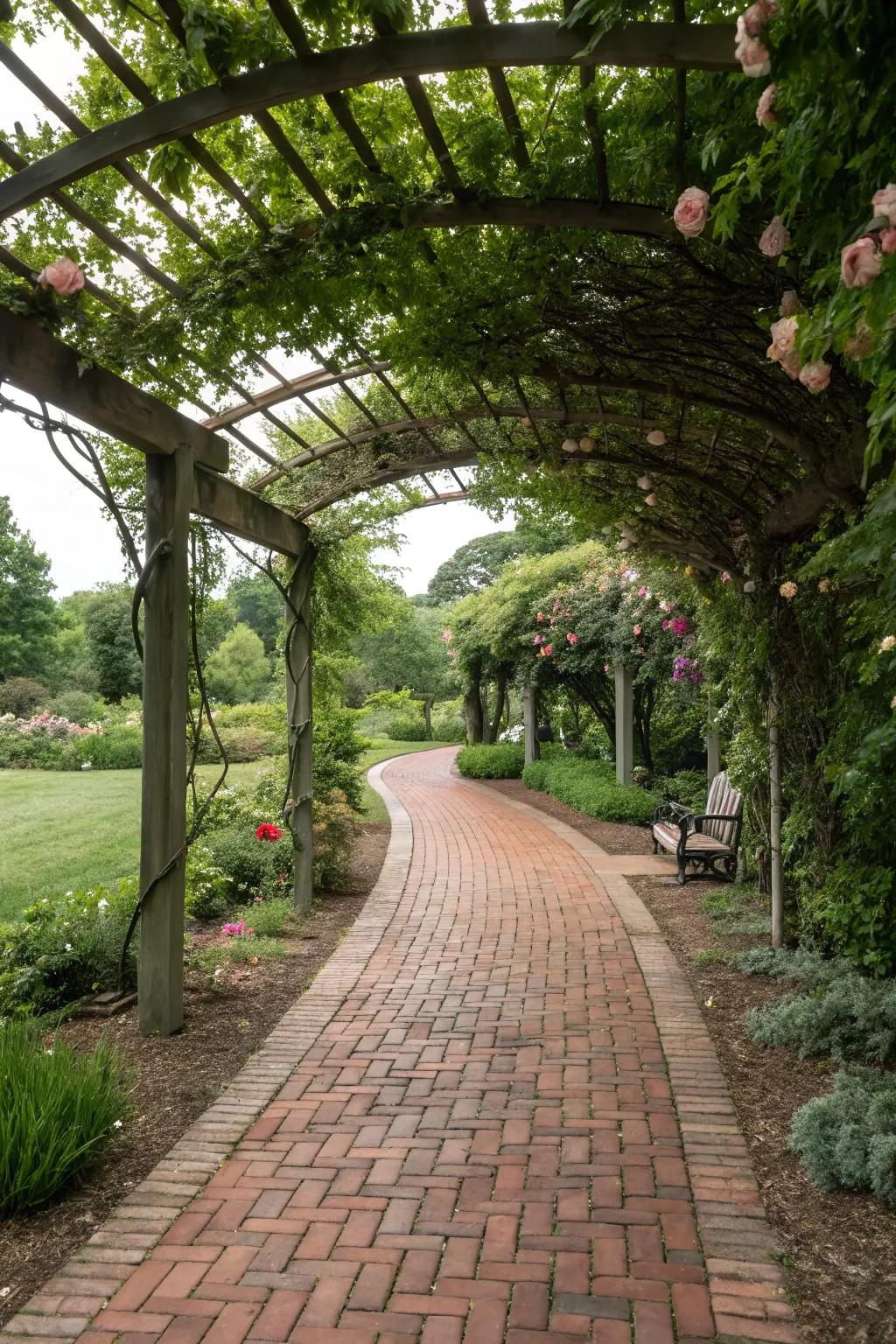 A timeless stone tile path inviting guests beneath a garden arbor.