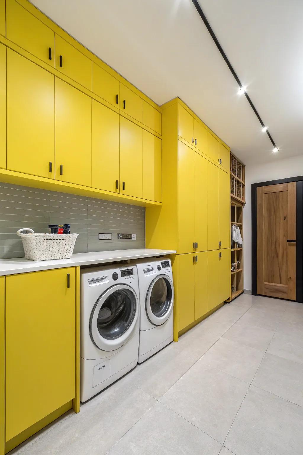 A cheerful utility room featuring yellow cabinets.