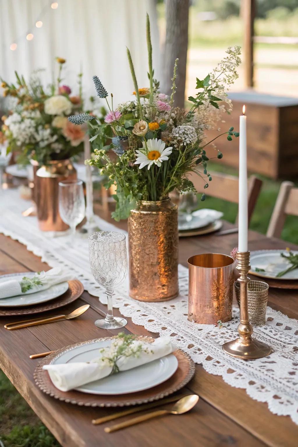 A rustic wedding table elegantly adorned with bronze accents.