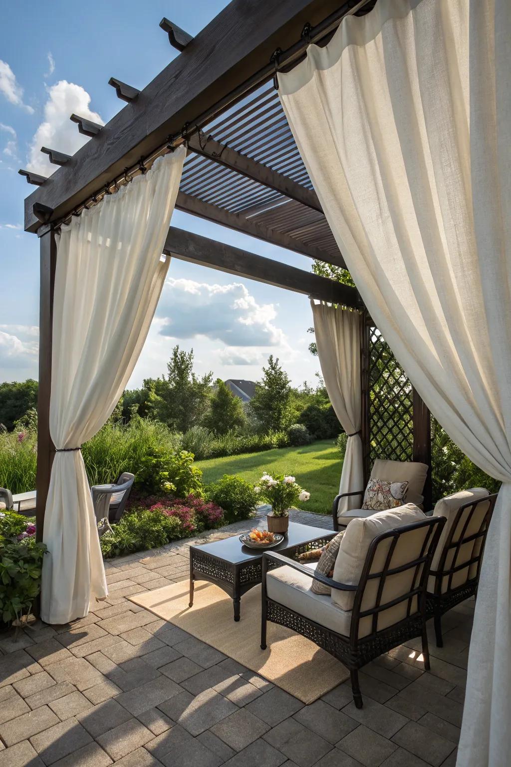 Outdoor curtains establish a private and comfortable space.