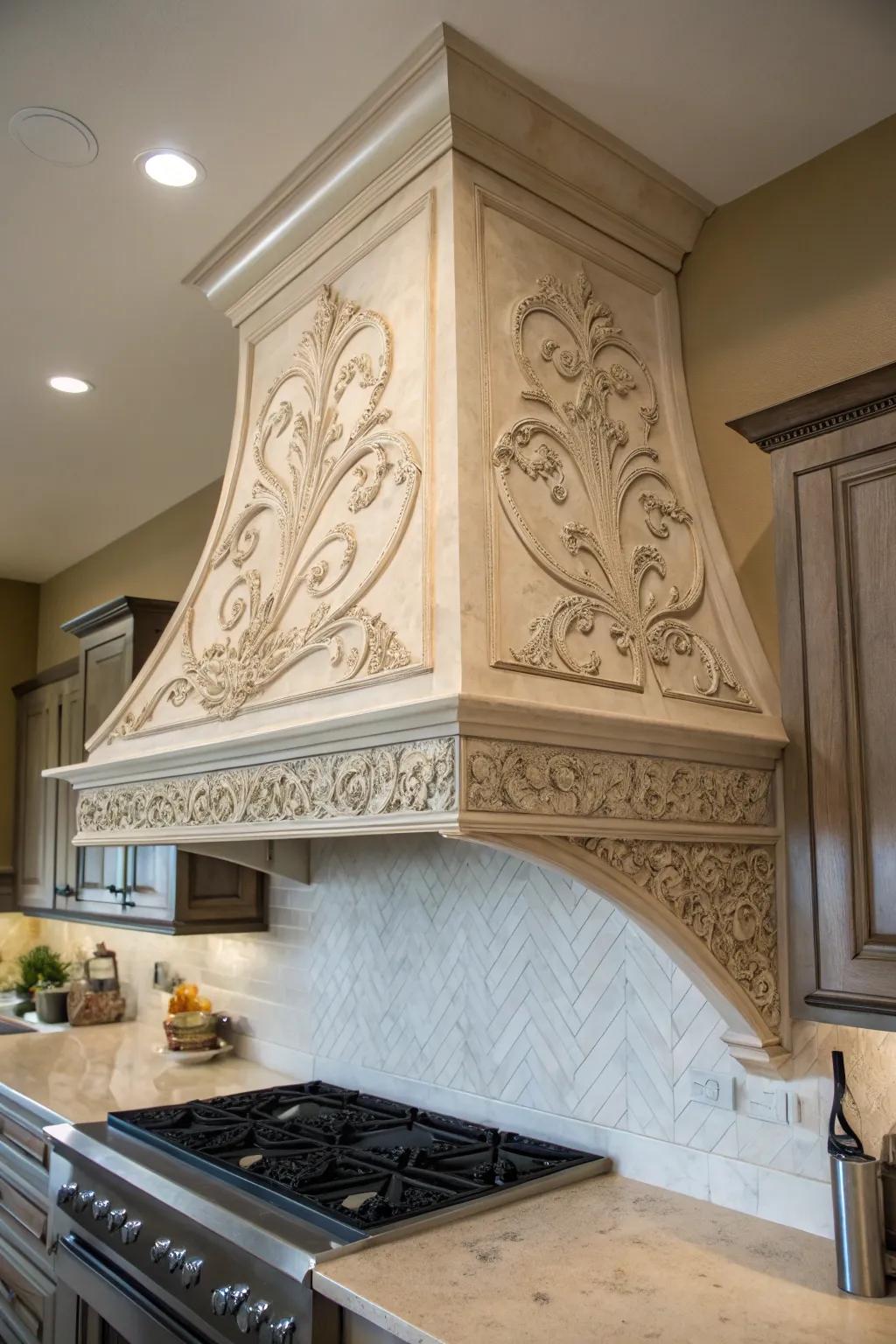 Artistic engravings add a unique ambiance to your range hood.